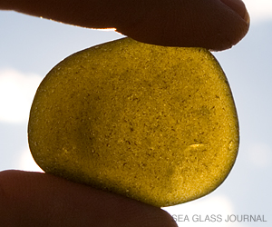 Place black sea glass in front of the sun.