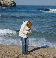 Rasuleva collecting sea glass