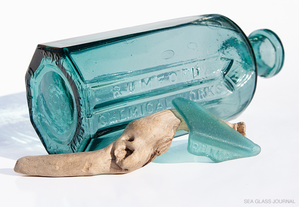 Teal-colored Rumford Bottle Shard Still Life Photo